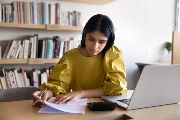 depositphotos_754542596-stock-photo-serious-young-indian-accountant-girl